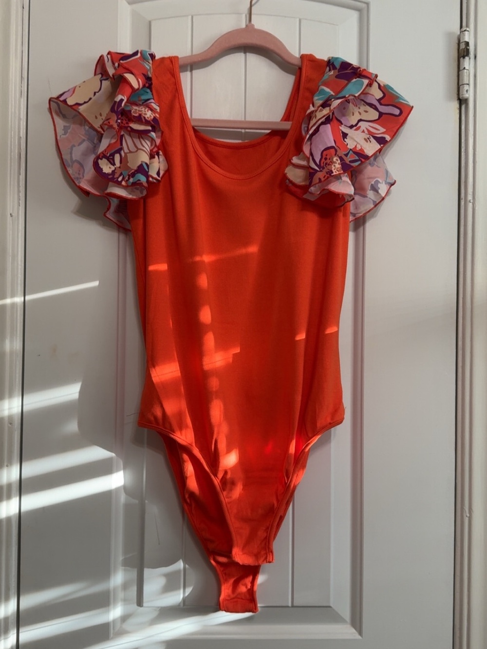 Bright Orange Ruffle-Sleeve Bodysuit
